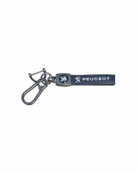 Llavero en cuero y zinc Peugeot